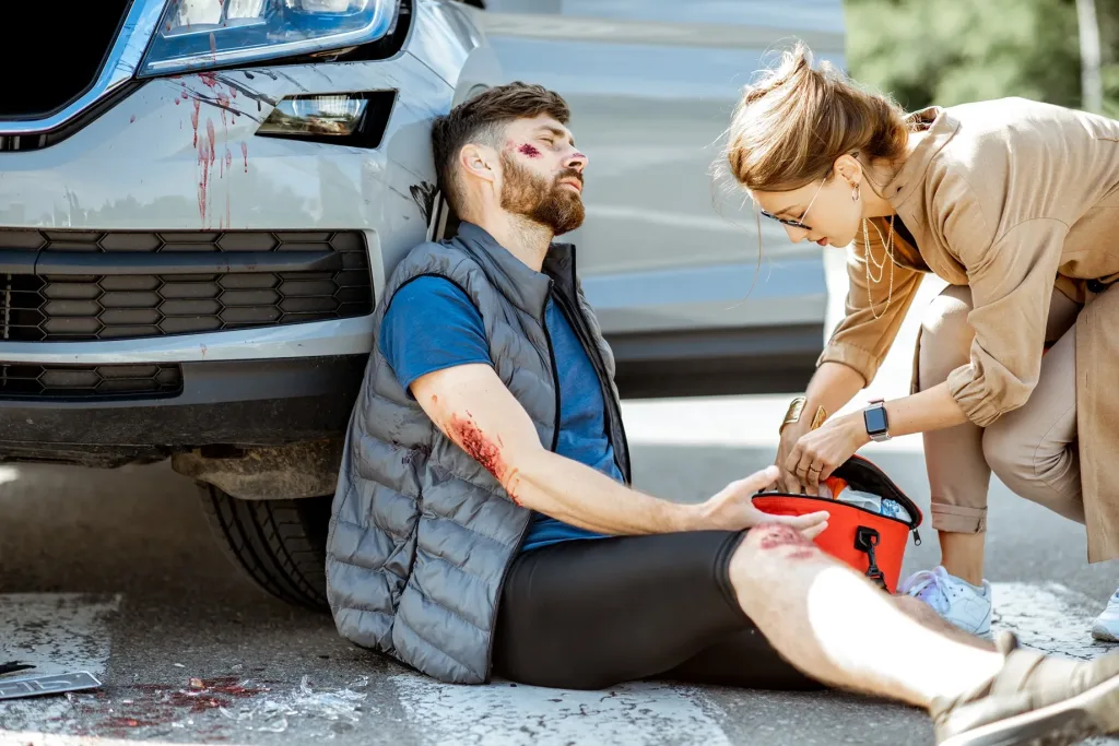 A pedestrian who has been hit by a car.